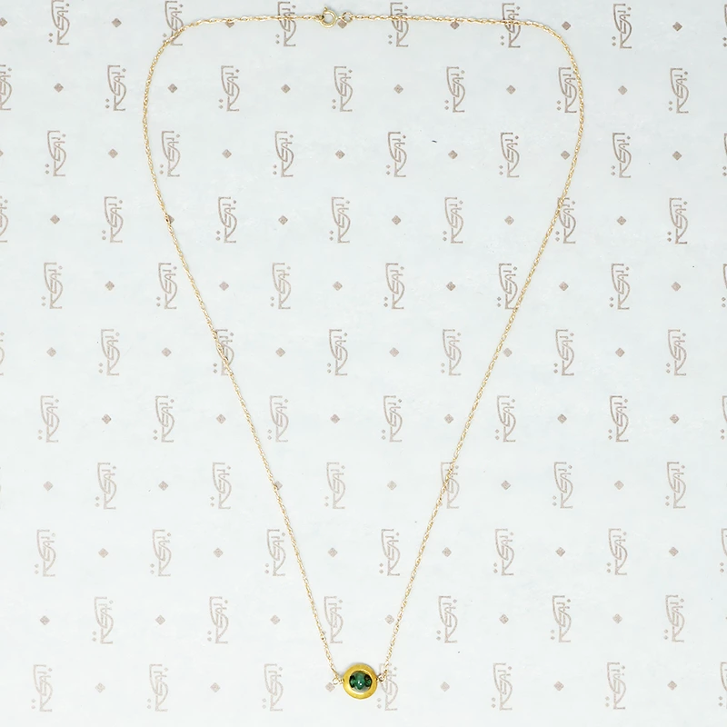 artisan necklace emeralds and recycled gold