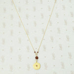 Glowing Gold Necklace with Ruby and Garnets by brunet