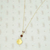 Glowing Gold Necklace with Ruby and Garnets by brunet