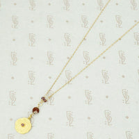 Glowing Gold Necklace with Ruby and Garnets by brunet