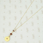 Glowing Gold Necklace with Ruby and Garnets by brunet