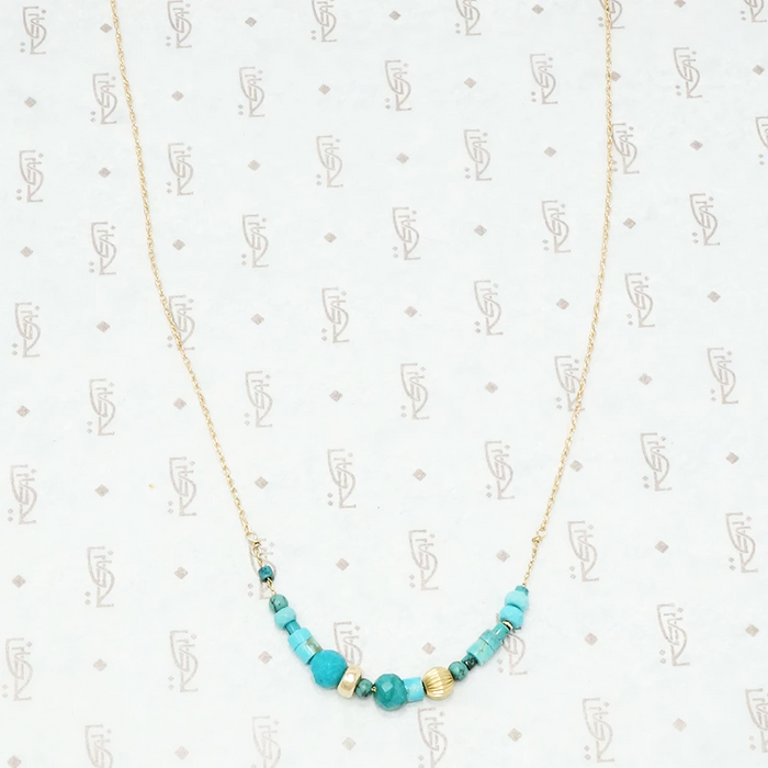 artisan crafted turquoise and gold necklace