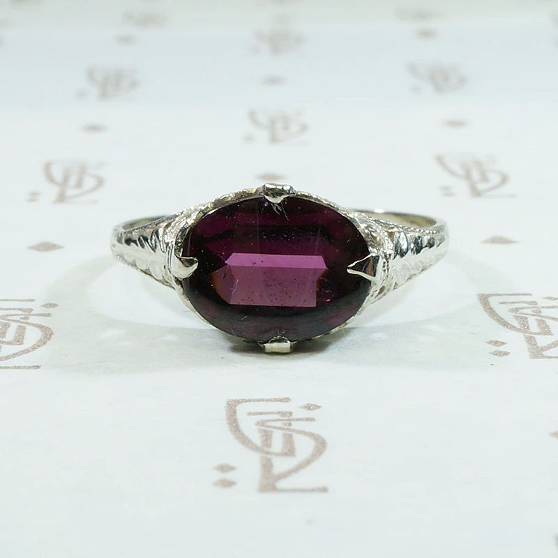 Raspberry Colored Buff Top Cut Garnet in White Gold