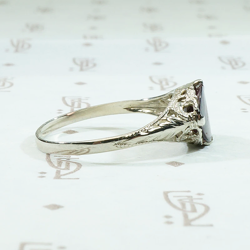 Raspberry Colored Buff Top Cut Garnet in White Gold