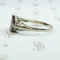 Raspberry Colored Buff Top Cut Garnet in White Gold