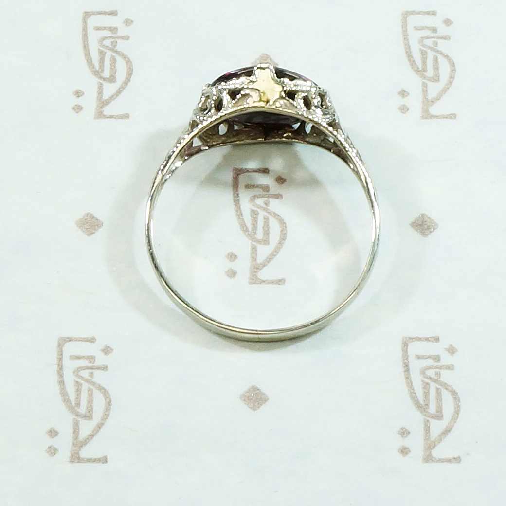 Raspberry Colored Buff Top Cut Garnet in White Gold