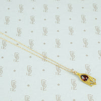 buff top garnet conversion pendant