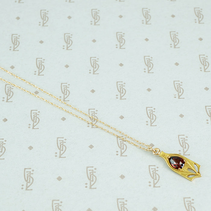 buff top garnet conversion pendant