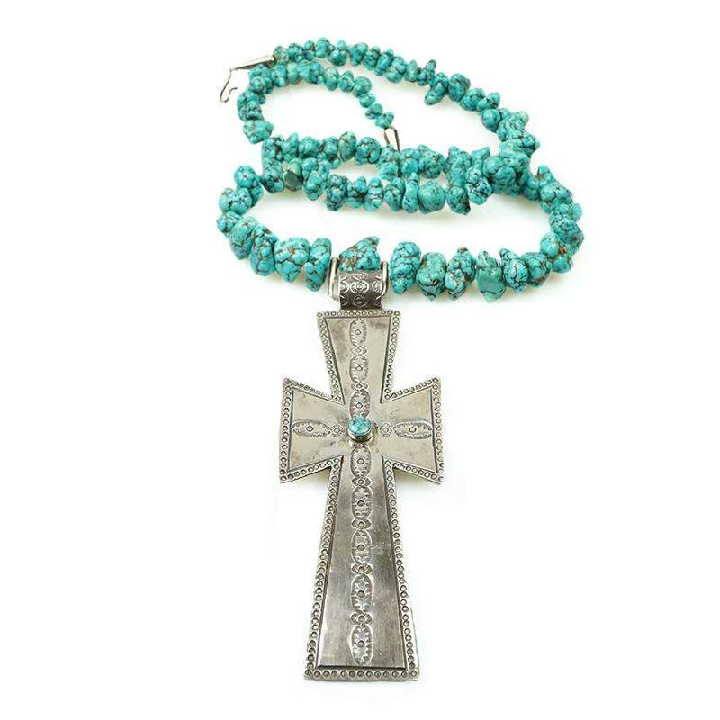 Long strand of Natural Turquoise Nuggets with a Large Silver Cross