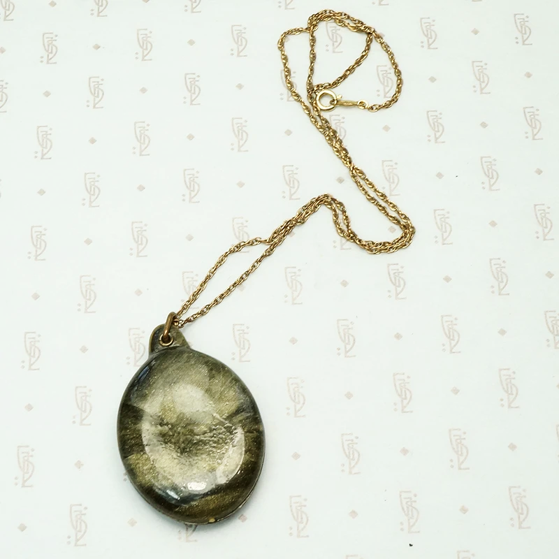 Shimmering Green Celluloid Sliding Locket