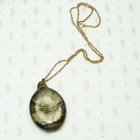 Shimmering Green Celluloid Sliding Locket
