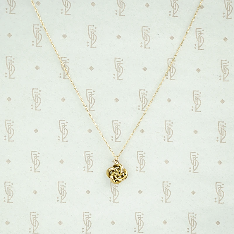 Antique Gold Love Knot Diamond Pendant