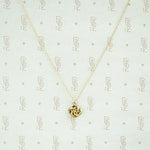 Antique Gold Love Knot Diamond Pendant