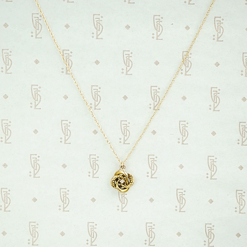 Antique Gold Love Knot Diamond Pendant