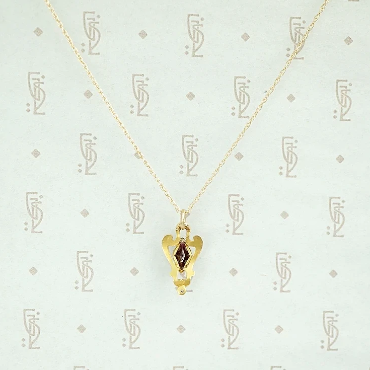 Turn of the Century Gold and Garnet Pendant