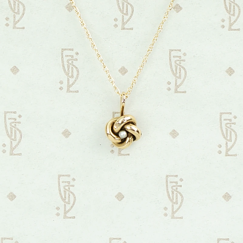 Tiny Love Knot Pendant With Pearl