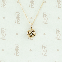 Tiny Love Knot Pendant With Pearl