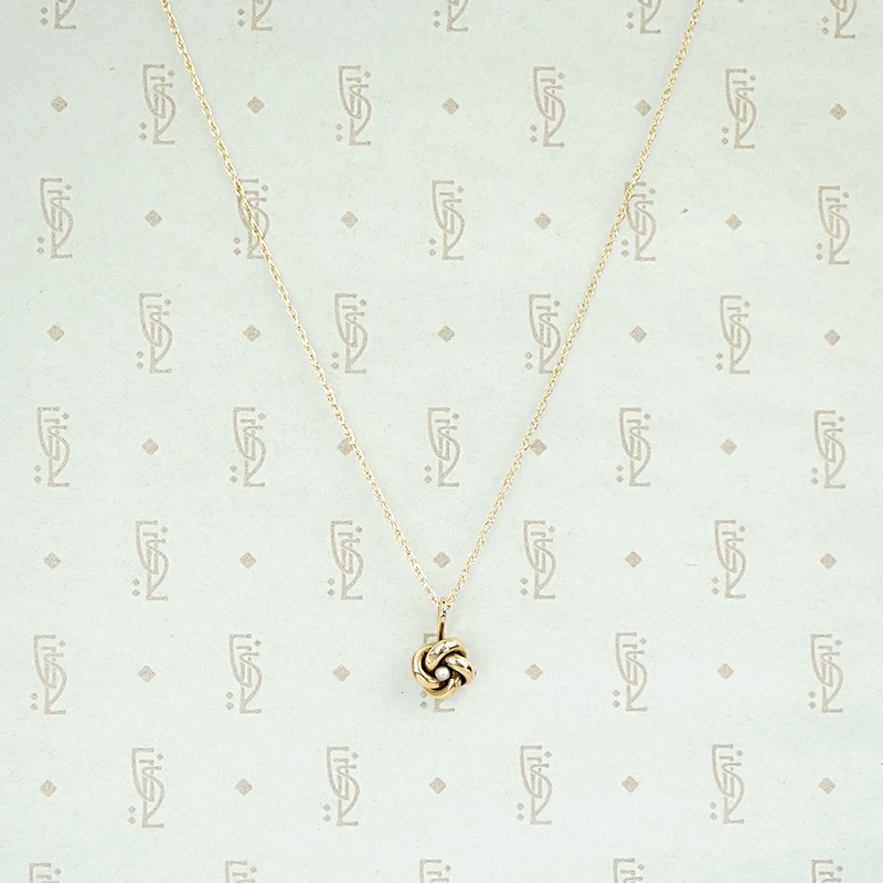 Tiny Love Knot Pendant With Pearl