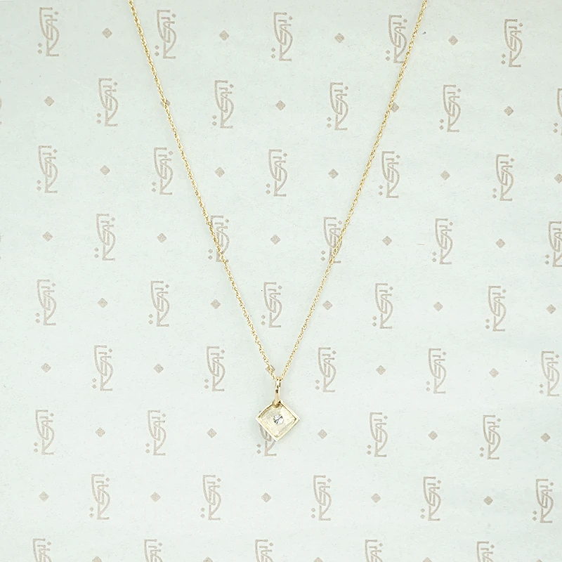 1920s Two Tone Gold and Diamond Pendant