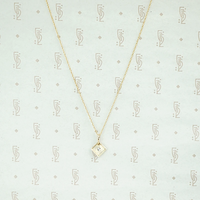 1920s Two Tone Gold and Diamond Pendant