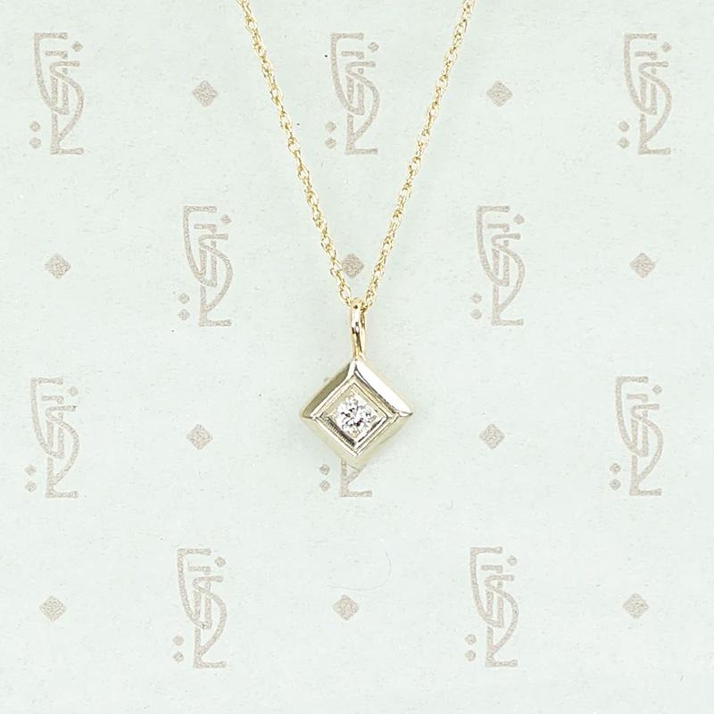 1920s Two Tone Gold and Diamond Pendant