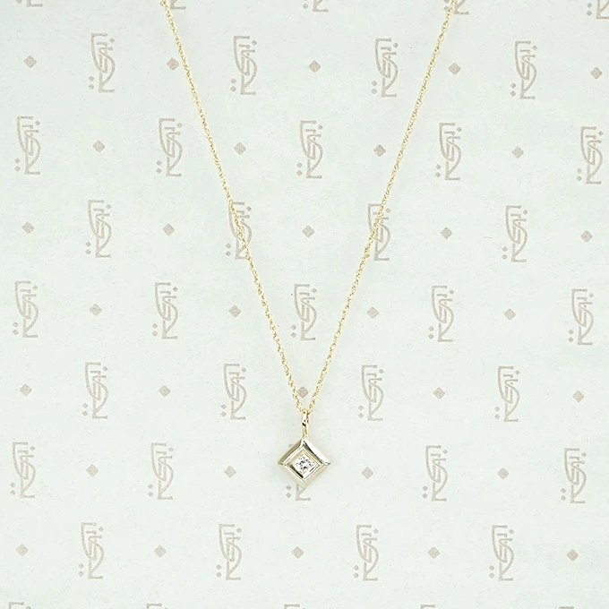 1920s Two Tone Gold and Diamond Pendant