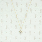 1920s Two Tone Gold and Diamond Pendant