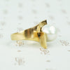 1970's chunky gold big pearl ring bypass style side viw