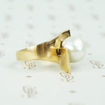 1970's chunky gold big pearl ring bypass style side viw