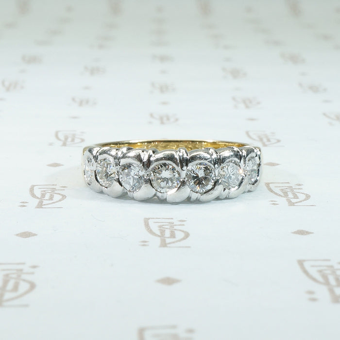 chunky heavy sculptural platinum on 18k yellow gold band with .75tcw diamonds