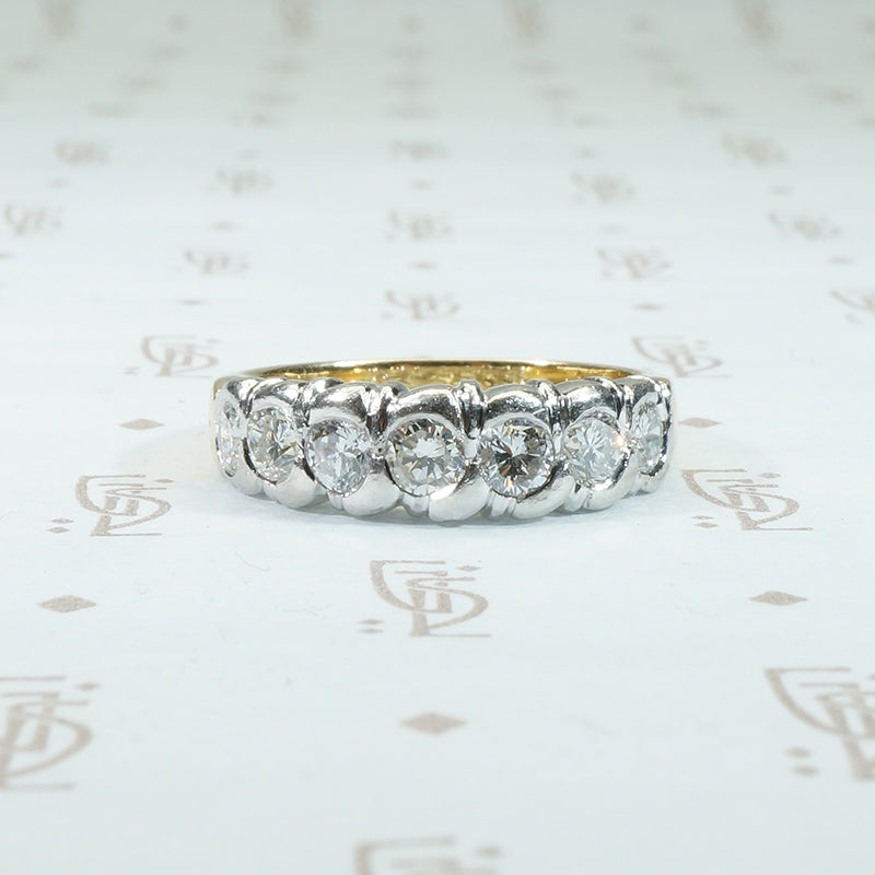 chunky heavy sculptural platinum on 18k yellow gold band with .75tcw diamonds