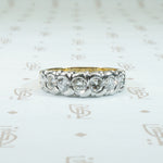 chunky heavy sculptural platinum on 18k yellow gold band with .75tcw diamonds