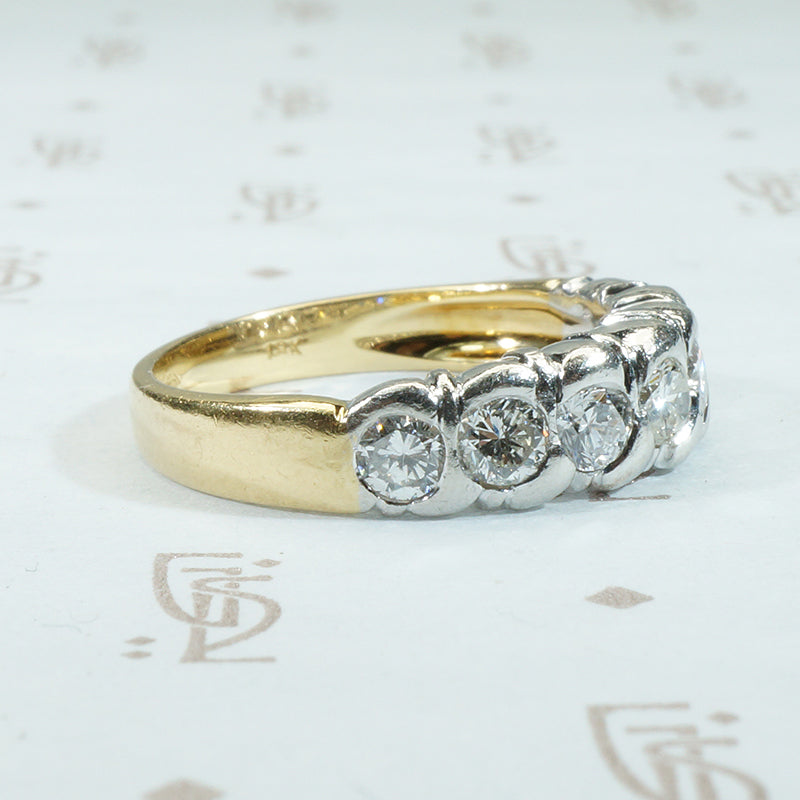 chunky heavy sculptural platinum on 18k yellow gold band with .75tcw diamonds