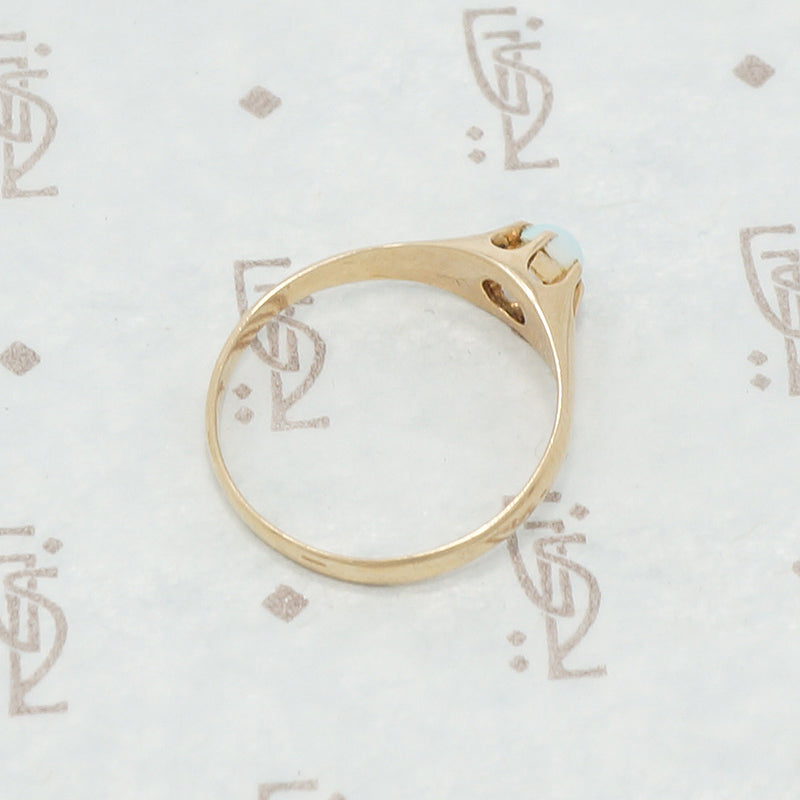 rose gold claw set opal ring top