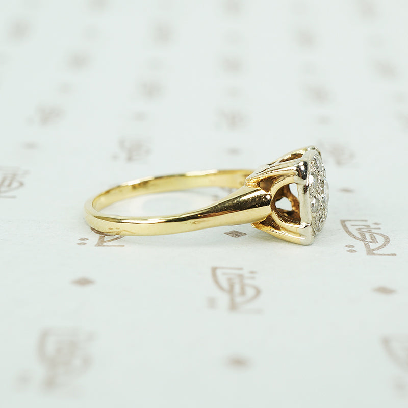2 tone cluster diamond vintage engagement ring side view