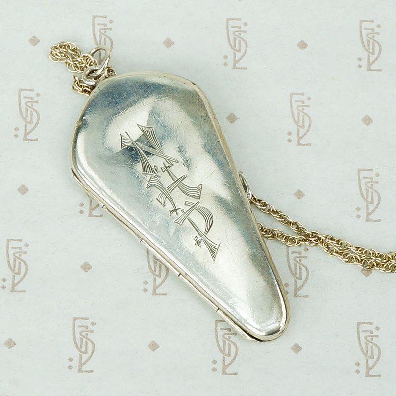 unusual coffin shaped silver antique locket