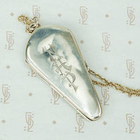 unusual coffin shaped silver antique locket