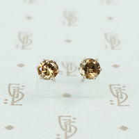 1 carat total weight cognac diamond studs in 18k white gold