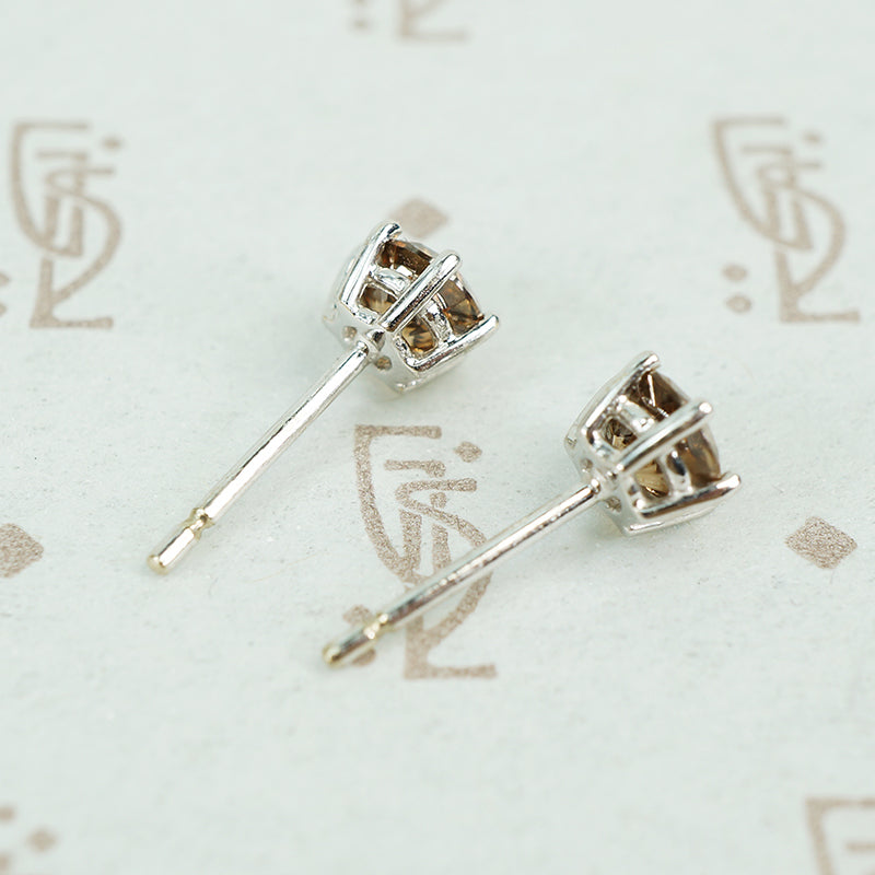 1 carat total weight cognac diamond studs in 18k white gold side view