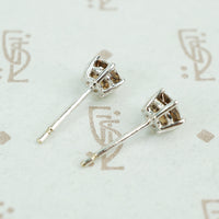 1 carat total weight cognac diamond studs in 18k white gold side view