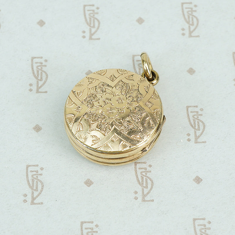 9ct locket with a 6 pence