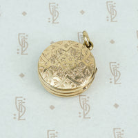 9ct locket with a 6 pence