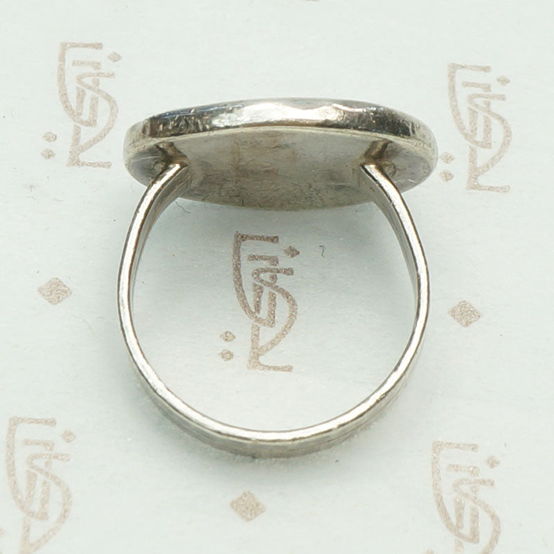 Roman Coin in Handmade Silver Ring, top view.