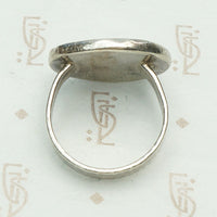 Roman Coin in Handmade Silver Ring, top view.