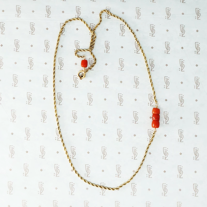 gold and coral rope chain