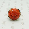 vintage 1950's carved red coral ring in gold, the coral is carved with daisies