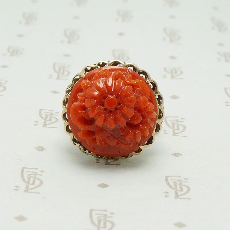 vintage 1950's carved red coral ring in gold, the coral is carved with daisies