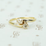 old mine cut diamond cross over yellow gold engagement ring