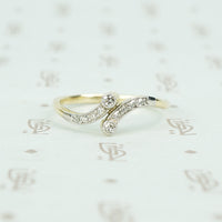vintage diamond platinum and gold crossover ring