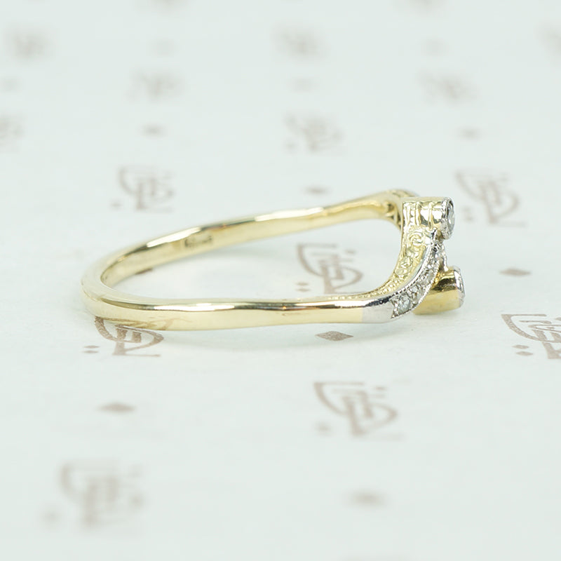 vintage diamond platinum and gold crossover ring side view